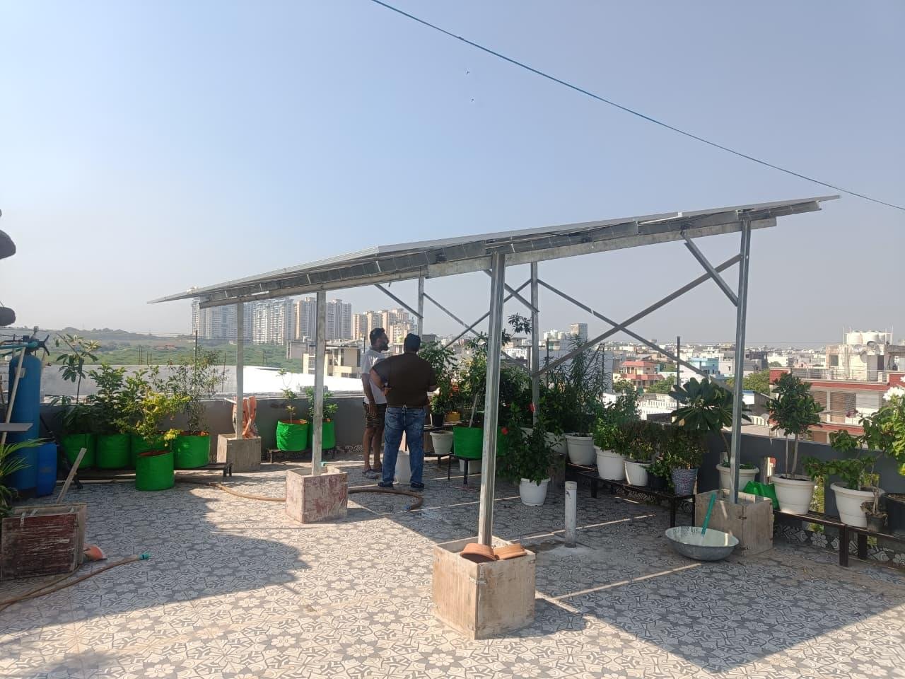 Rooftop solar panels installed on industrial structure